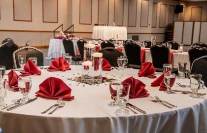 Tables set up for event in Alumni Room